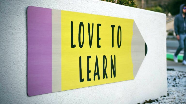 Love to Learn sign outside a school